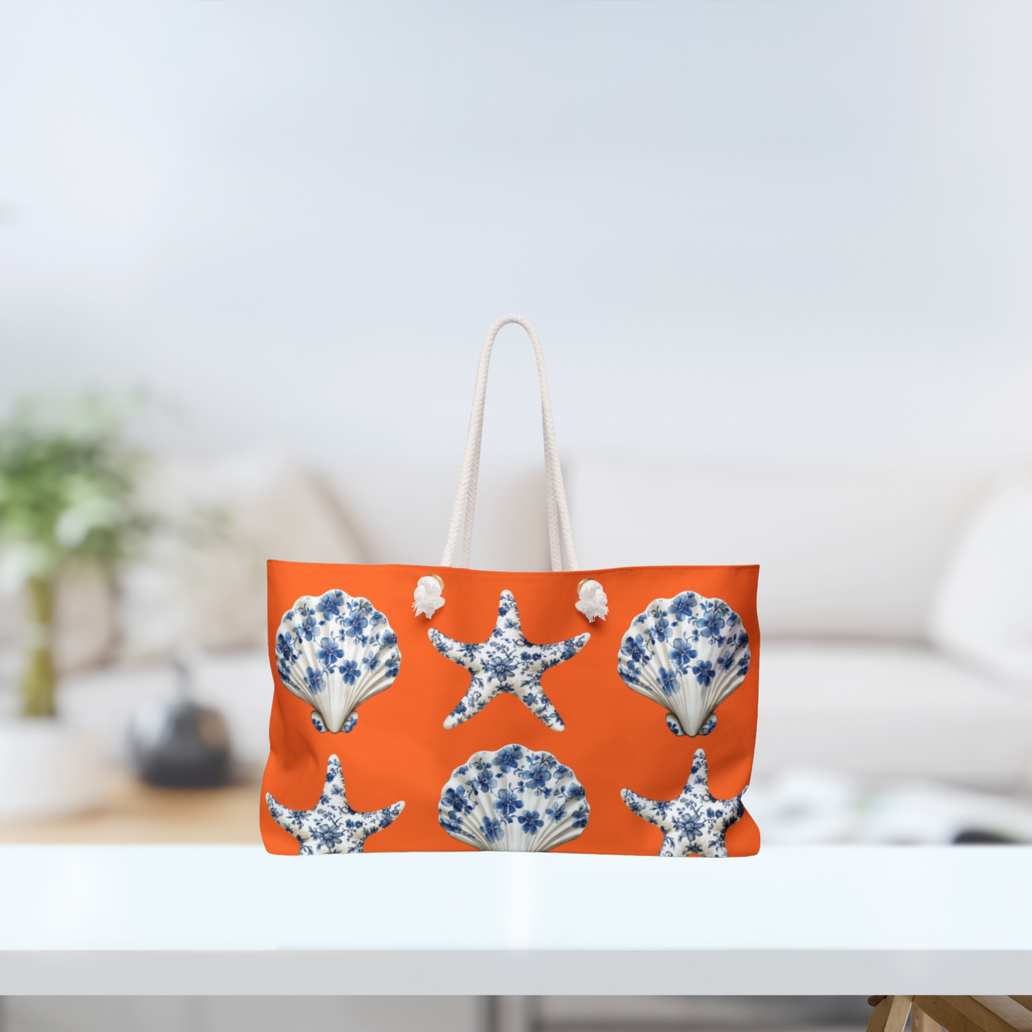 Weakender bag in orange with blue and white china seashells